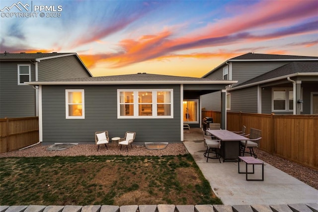 8093 Yellowleaf Pl, Colorado Springs, CO 80908 - back of house with a fenced backyard, a patio area, and a yard