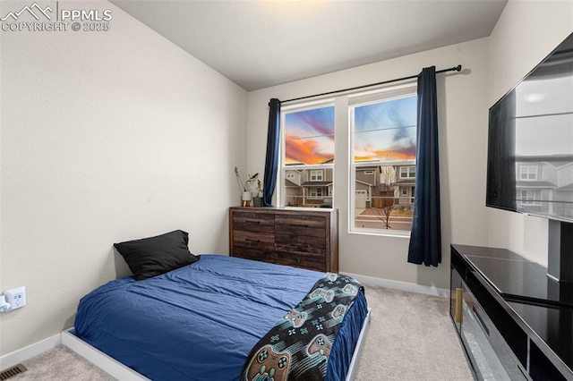 8093 Yellowleaf Pl, Colorado Springs, CO 80908 - bedroom with carpet, baseboards, and visible vents
