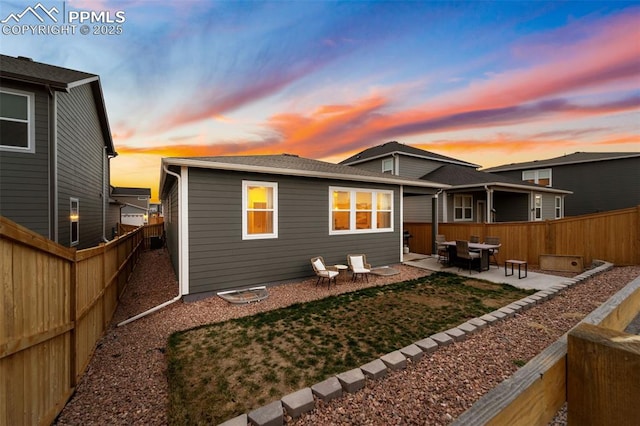 8093 Yellowleaf Pl, Colorado Springs, CO 80908 - back of property with a fenced backyard and a patio area