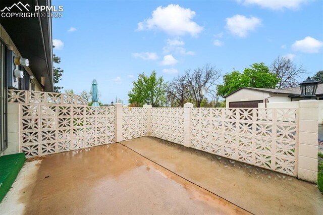 3314 Valley Hi Ave Unit B, Colorado Springs, CO 80910 - view of patio / terrace featuring fence