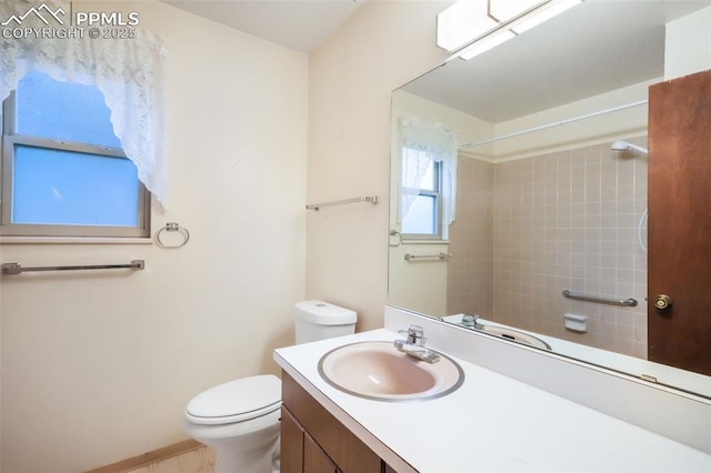 3314 Valley Hi Ave Unit B, Colorado Springs, CO 80910 - full bathroom with toilet, vanity, a shower, and baseboards