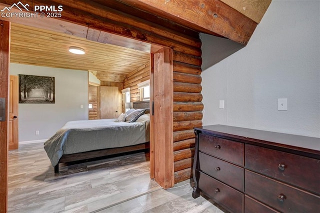3645 Doolittle Rd, Monument, CO 80132 - bedroom featuring log walls, wood ceiling, baseboards, and vaulted ceiling