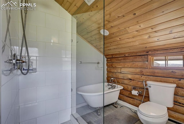 3645 Doolittle Rd, Monument, CO 80132 - full bath with vaulted ceiling, rustic walls, wood ceiling, a freestanding tub, and toilet