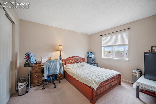 7136 Purple Thistle Ct, Colorado Springs, CO 80922 - carpeted bedroom featuring a closet, an office area, and baseboards