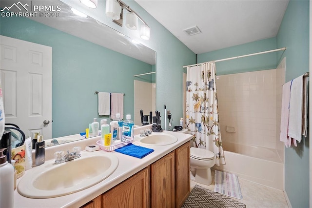 7136 Purple Thistle Ct, Colorado Springs, CO 80922 - bathroom featuring toilet, shower / bath combo, double vanity, and tile patterned floors