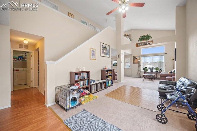 7136 Purple Thistle Ct, Colorado Springs, CO 80922 - interior space with ceiling fan, wood finished floors, high vaulted ceiling, and baseboards