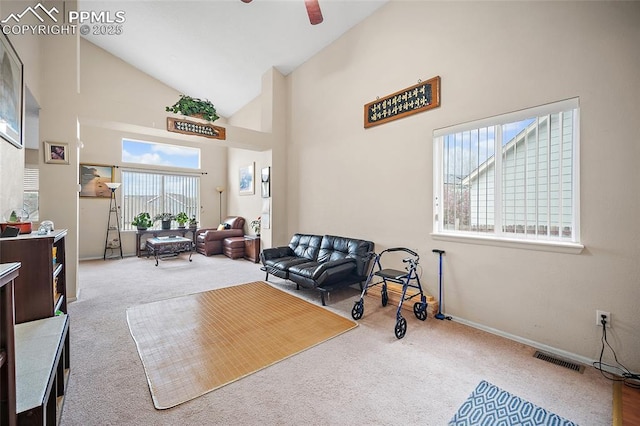 7136 Purple Thistle Ct, Colorado Springs, CO 80922 - living area featuring carpet, high vaulted ceiling, a ceiling fan, and baseboards