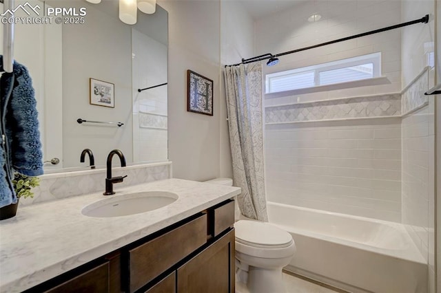 bathroom featuring toilet, shower / tub combo with curtain, and vanity