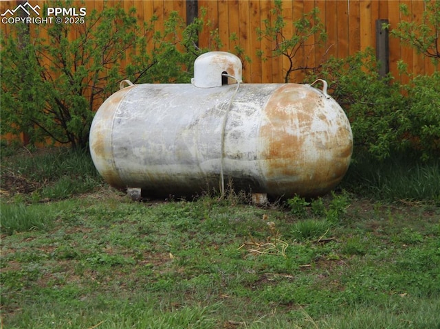 exterior view of gas tank and fence