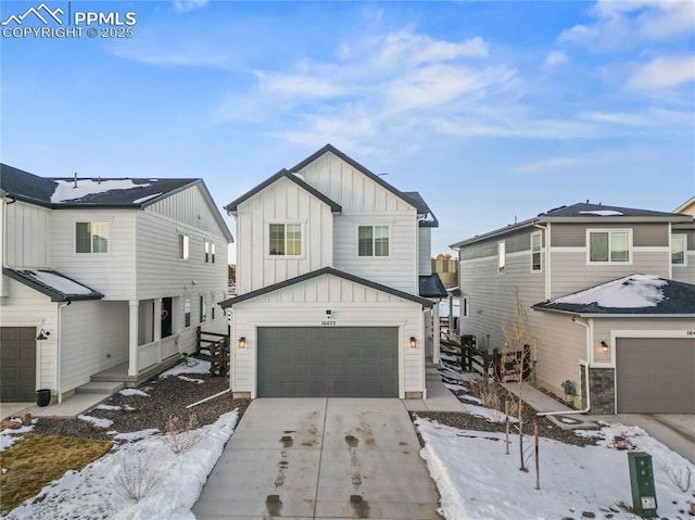 16422 Mountain Flax Dr, Monument, CO 80132 - view of front of house featuring board and batten siding and concrete driveway