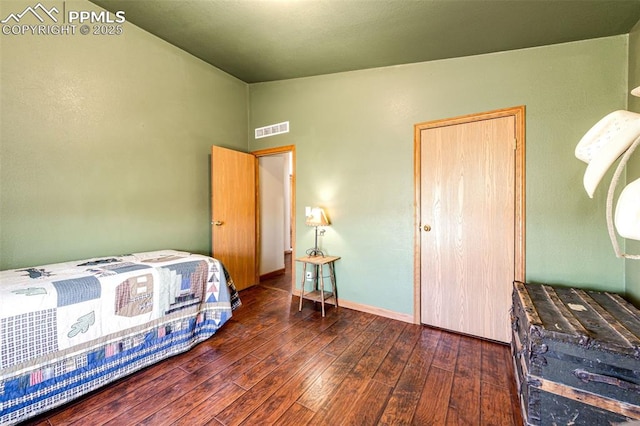 26985 Flower Cir, Simla, CO 80835 - bedroom with wood finished floors, lofted ceiling, and baseboards