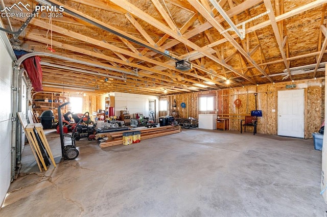 26985 Flower Cir, Simla, CO 80835 - garage featuring a garage door opener