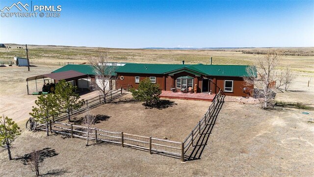 26985 Flower Cir, Simla, CO 80835 - view of front of house with metal roof and a rural view