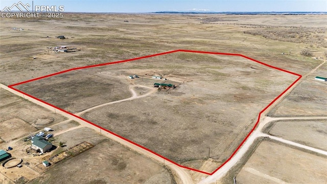 26985 Flower Cir, Simla, CO 80835 - overview of rural landscape with property boundaries highlighted and a desert landscape