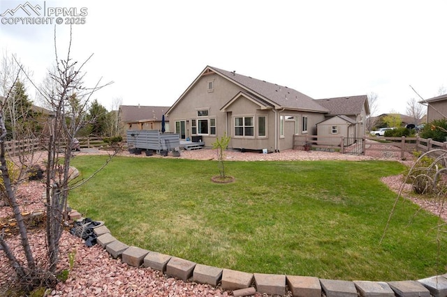 rear view of property with stucco siding