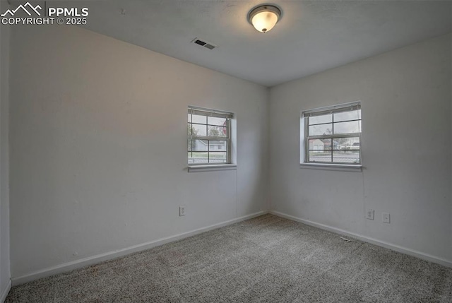 505 2nd Ave, Deer Trail, CO 80105 - carpeted empty room featuring baseboards