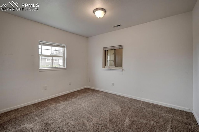505 2nd Ave, Deer Trail, CO 80105 - carpeted spare room featuring baseboards