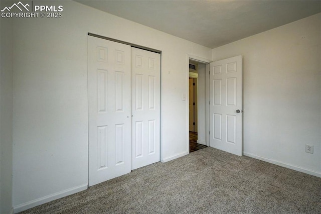 505 2nd Ave, Deer Trail, CO 80105 - unfurnished bedroom featuring carpet, baseboards, and a closet