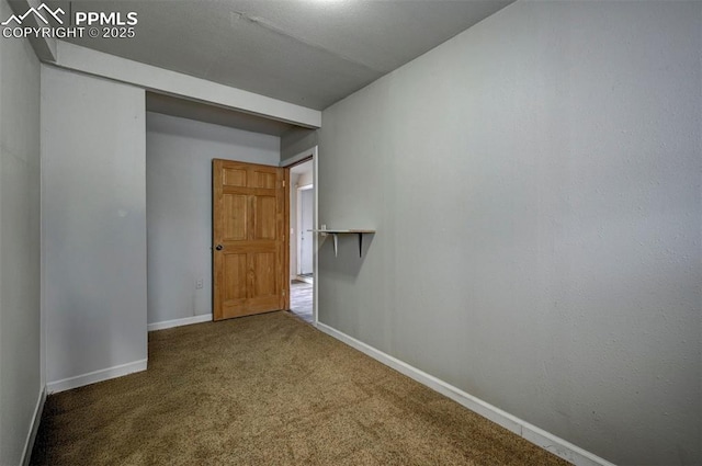 505 2nd Ave, Deer Trail, CO 80105 - carpeted empty room featuring baseboards