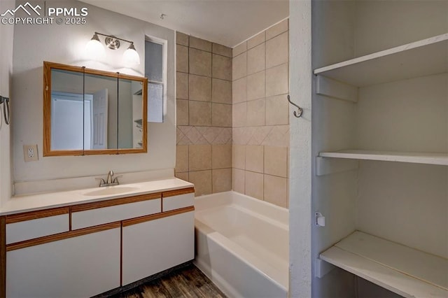 505 2nd Ave, Deer Trail, CO 80105 - full bath featuring vanity, wood finished floors, and  shower combination