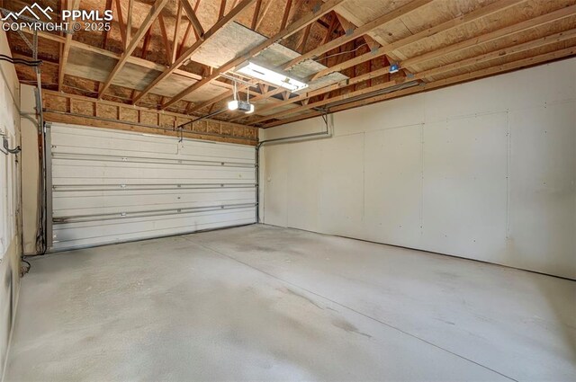 505 2nd Ave, Deer Trail, CO 80105 - garage with a garage door opener