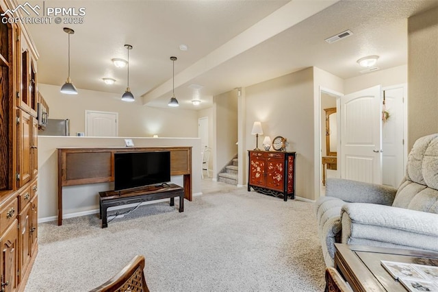 7567 Black Spruce Hts, Colorado Springs, CO 80908 - living area with light carpet, stairs, and baseboards