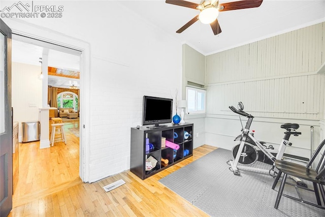 313 E Evans Ave, Pueblo, CO 81004 - exercise area featuring a ceiling fan, wood-type flooring, and plenty of natural light