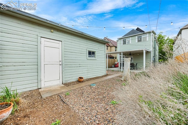 313 E Evans Ave, Pueblo, CO 81004 - rear view of house with a patio and fence
