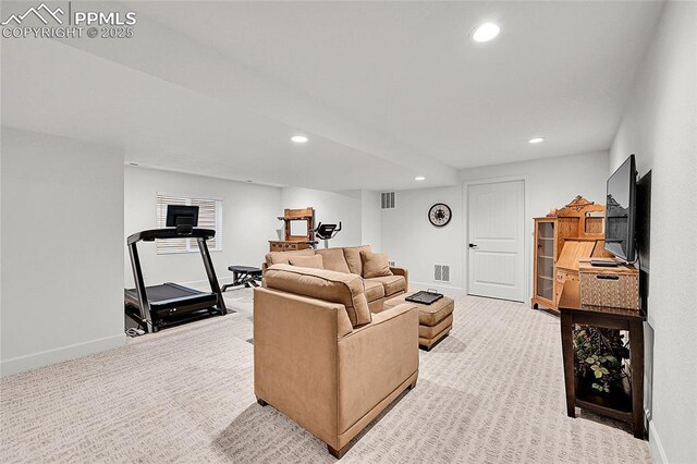 6016 Haster Grv, Colorado Springs, CO 80927 - living room with recessed lighting, light colored carpet, and baseboards