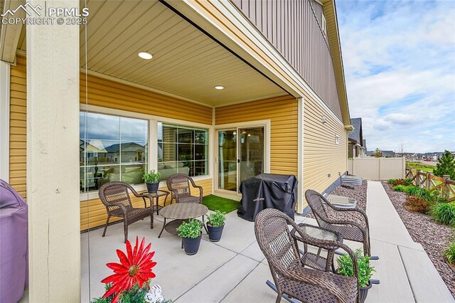 6016 Haster Grv, Colorado Springs, CO 80927 - view of patio with fence and a grill