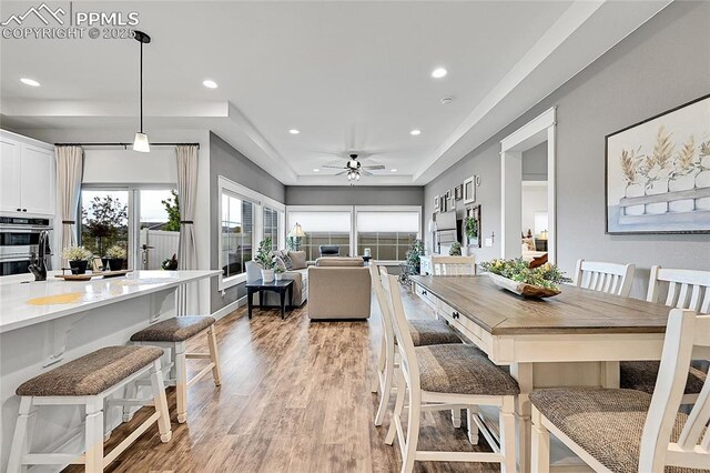 6016 Haster Grv, Colorado Springs, CO 80927 - dining room featuring a ceiling fan, light wood finished floors, and recessed lighting