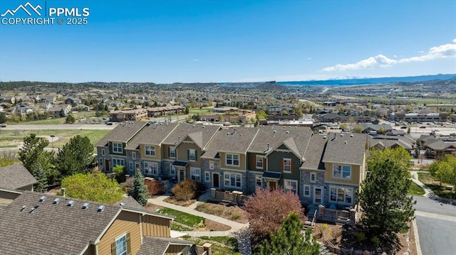 aerial perspective of suburban area featuring mountains