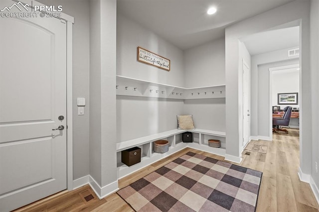 3293 Offbeaten Pl, Castle Rock, CO 80108 - mudroom with wood finished floors, baseboards, and recessed lighting
