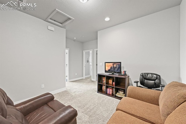 3293 Offbeaten Pl, Castle Rock, CO 80108 - carpeted living area with attic access, baseboards, recessed lighting, and a textured ceiling
