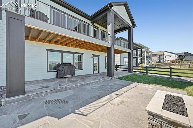 3293 Offbeaten Pl, Castle Rock, CO 80108 - back of property featuring a patio and a residential view