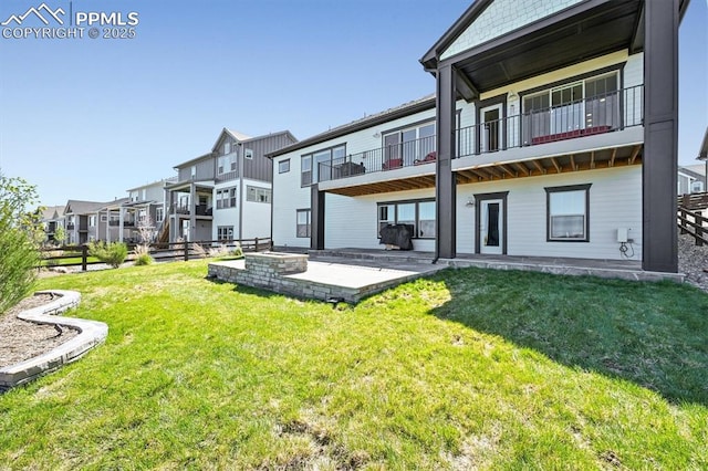 3293 Offbeaten Pl, Castle Rock, CO 80108 - rear view of house with a patio area, a yard, a residential view, and a balcony