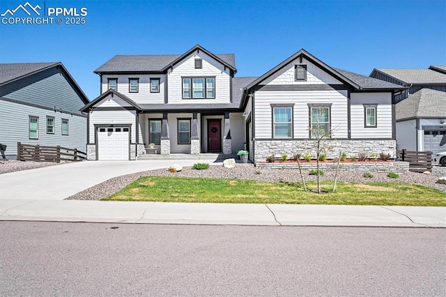 3293 Offbeaten Pl, Castle Rock, CO 80108 - view of front facade featuring stone siding, driveway, covered porch, and a front lawn