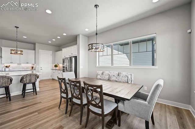 3293 Offbeaten Pl, Castle Rock, CO 80108 - dining room with a chandelier, recessed lighting, light wood-style flooring, and baseboards