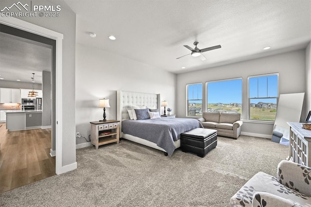 3293 Offbeaten Pl, Castle Rock, CO 80108 - bedroom featuring baseboards, light colored carpet, recessed lighting, and a ceiling fan
