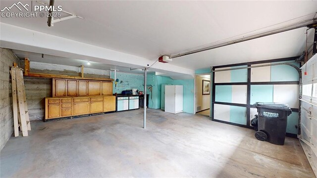4012 Maxwell Pl, Colorado Springs, CO 80909 - garage with a garage door opener