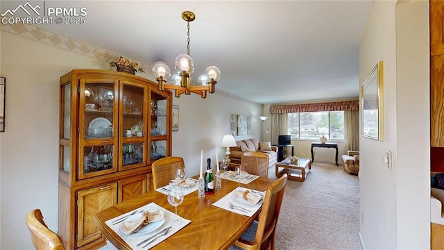 4012 Maxwell Pl, Colorado Springs, CO 80909 - dining room with a chandelier and carpet