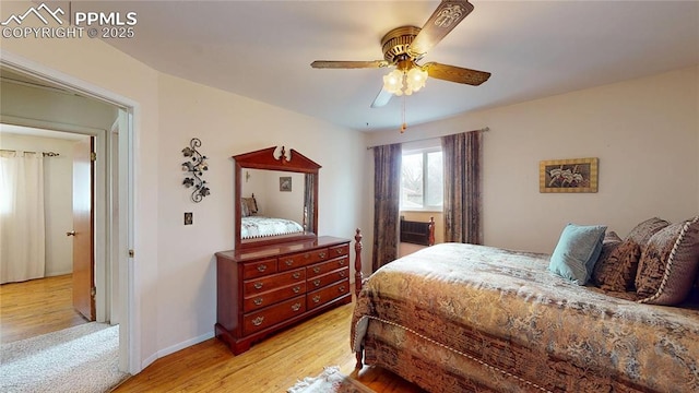 4012 Maxwell Pl, Colorado Springs, CO 80909 - bedroom with light wood-type flooring, ceiling fan, and baseboards