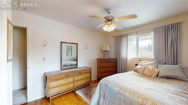 4012 Maxwell Pl, Colorado Springs, CO 80909 - bedroom featuring light wood-style flooring, baseboards, and a ceiling fan