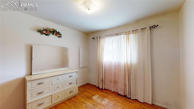 4012 Maxwell Pl, Colorado Springs, CO 80909 - unfurnished bedroom featuring light wood-type flooring and baseboards