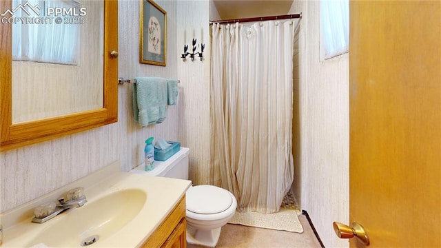 4012 Maxwell Pl, Colorado Springs, CO 80909 - full bathroom with vanity, toilet, a shower with curtain, and healthy amount of natural light