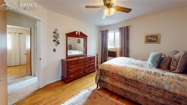 4012 Maxwell Pl, Colorado Springs, CO 80909 - bedroom featuring light wood-style floors, ceiling fan, and baseboards