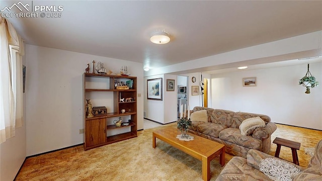 4012 Maxwell Pl, Colorado Springs, CO 80909 - living room featuring light carpet