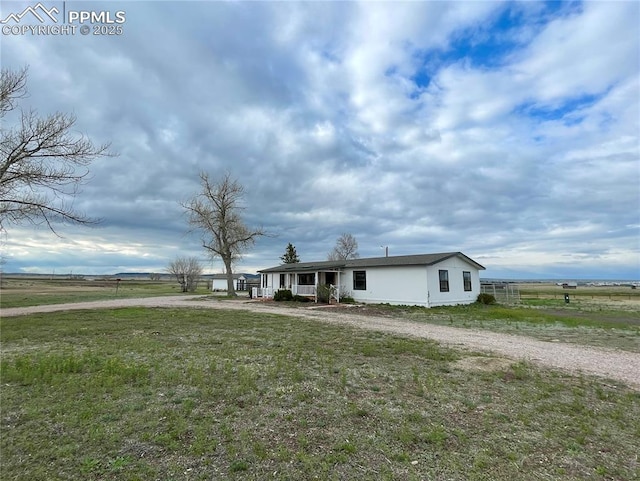 17940 Countdown Dr, Peyton, CO 80831 - manufactured / mobile home featuring covered porch