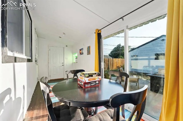 739 S Utica St, Denver, CO 80219 - dining space featuring lofted ceiling