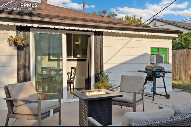 739 S Utica St, Denver, CO 80219 - view of patio with a fire pit, fence, and grilling area